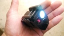 Small flashlight with red laser sight